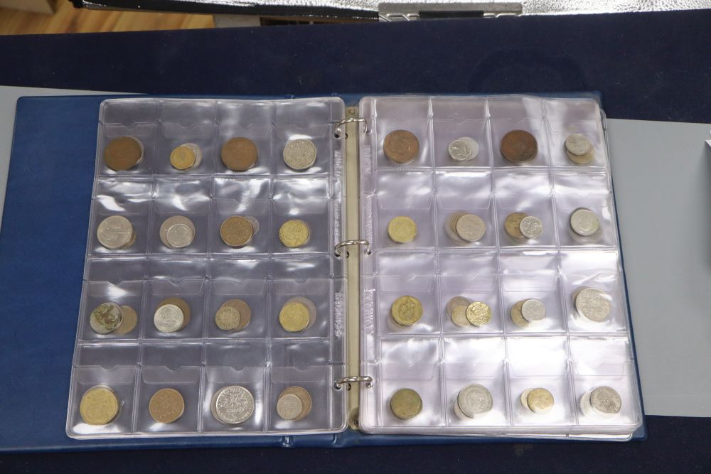 Two albums of world coins and other UK coinage including pennies